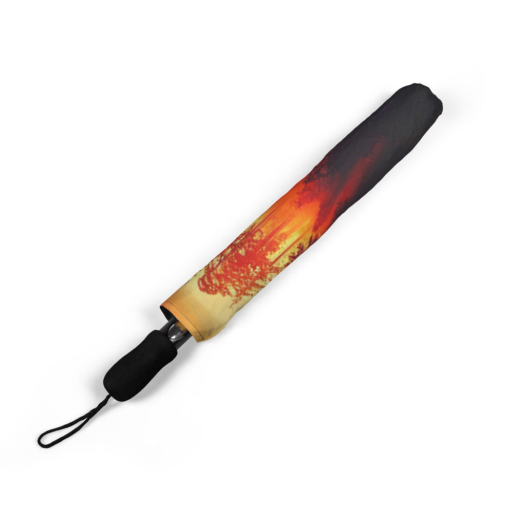 The Laughing Sinner Sunset Umbrella for rainy days, sunny days or for anytime.